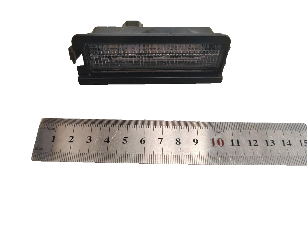 Left License Plate Lamp